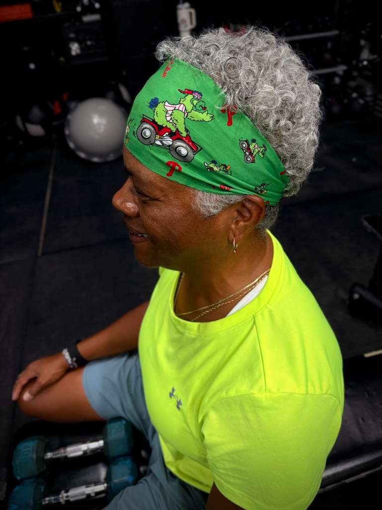Smiling client taking a break between sets